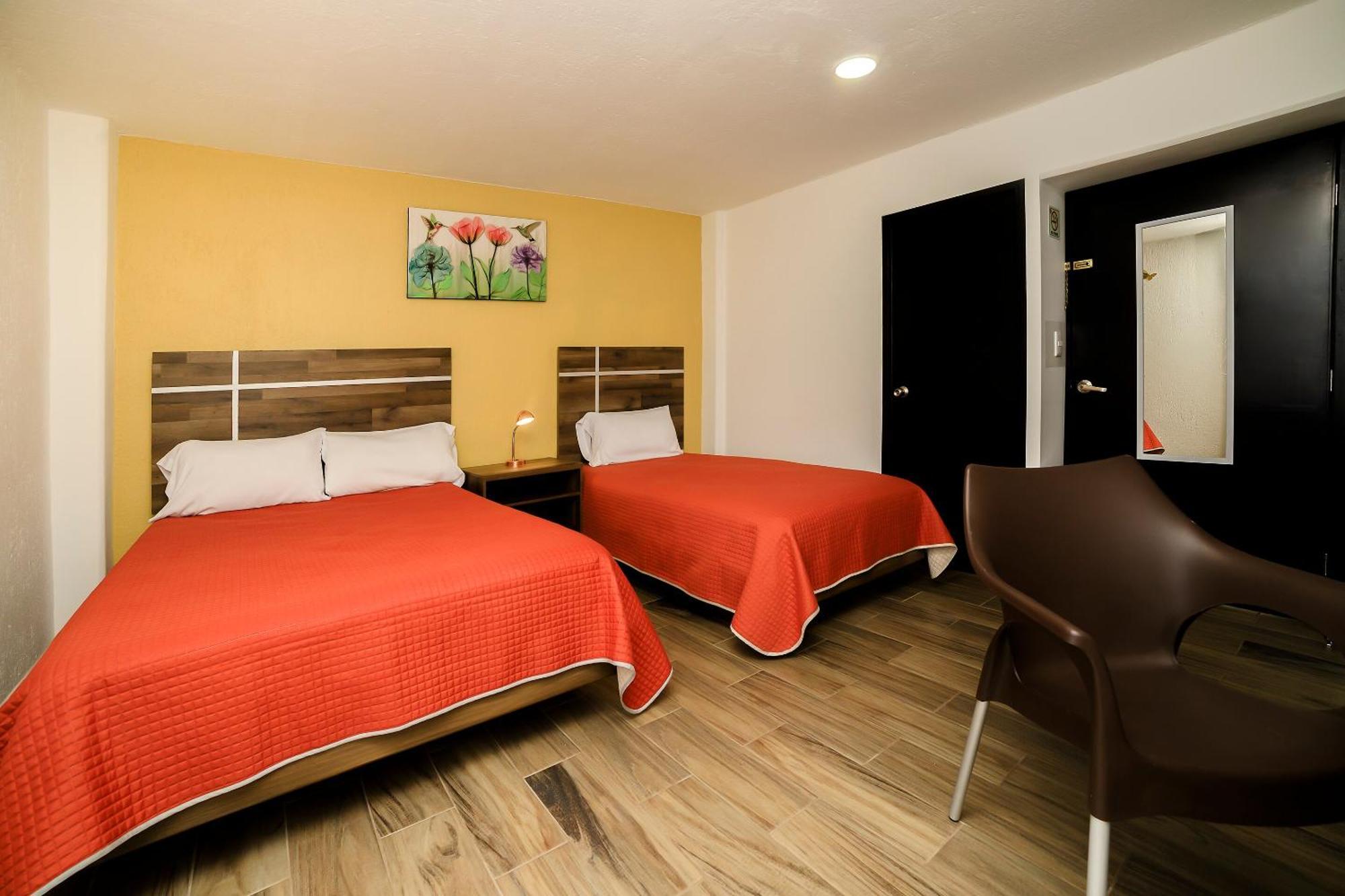 Capital O Boutique Torres Hotel